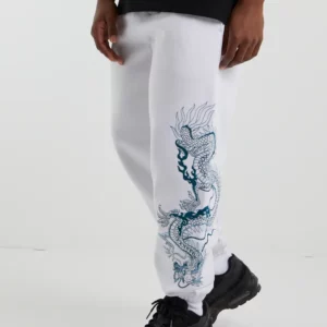DRAGON EMBROIDERED BAGGY TRACK PANTS IN WHITE
